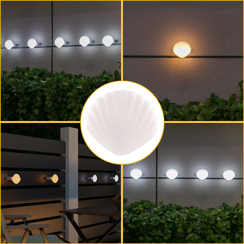 Shell-shaped compact outdoor LED wall lamp