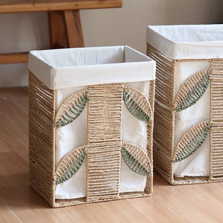 Elegant laundry basket made of natural wicker with fabric lining