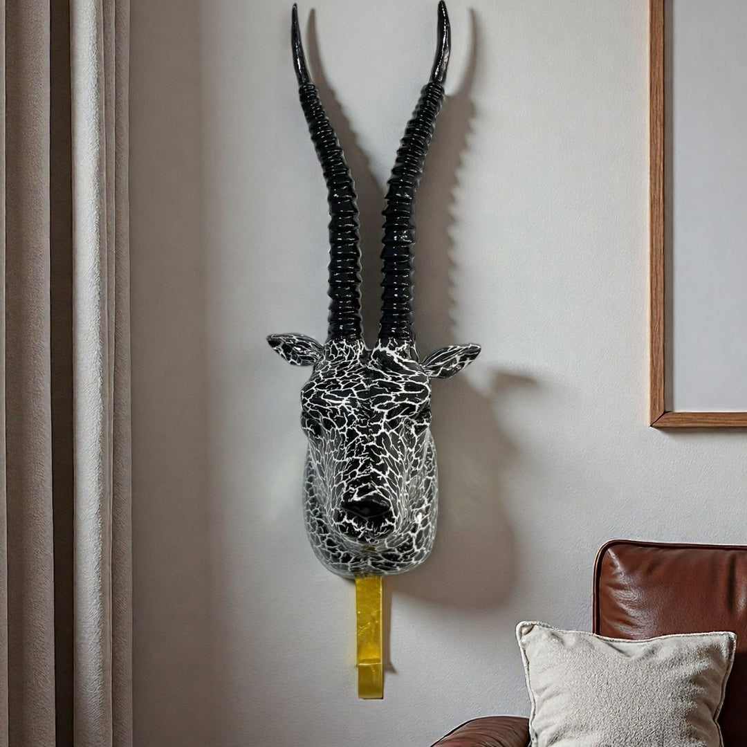 Wall hook in the form of a stylized unicorn