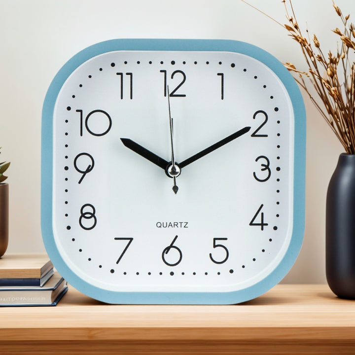 Table clock in modern cubic design