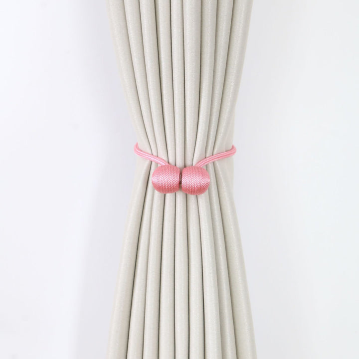Decorative curtain tieback