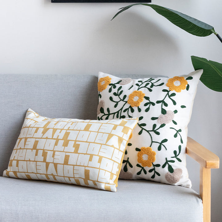 Rectangular decorative lumbar pillow with typographic jacquard pattern