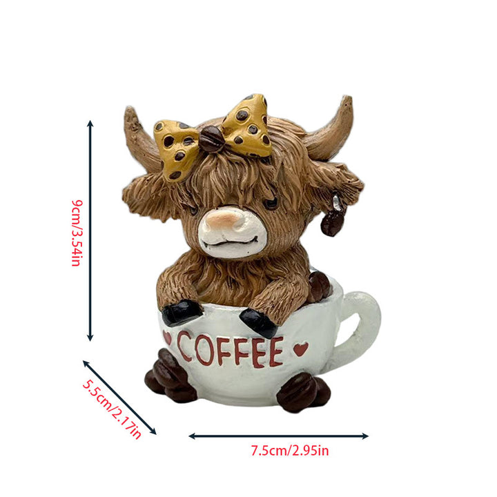Decorative figure of a Highland cow with accessories