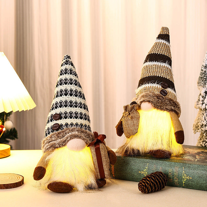 Decorative Christmas gnome with gift package