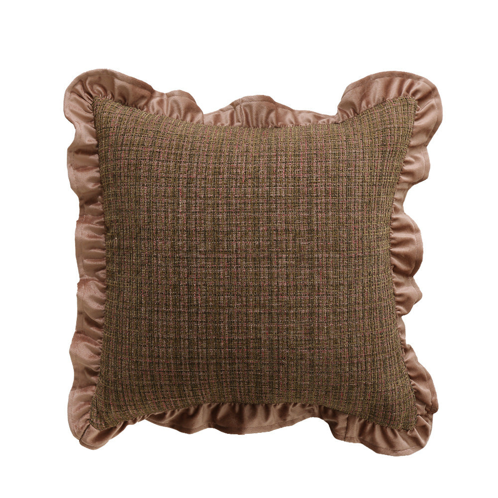 Square decorative pillow with woven linen texture and decorative ruffled edge