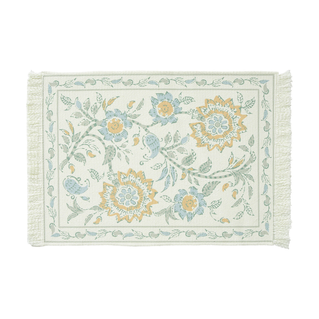 Round handmade woven decorative rug with fringes and botanical pattern
