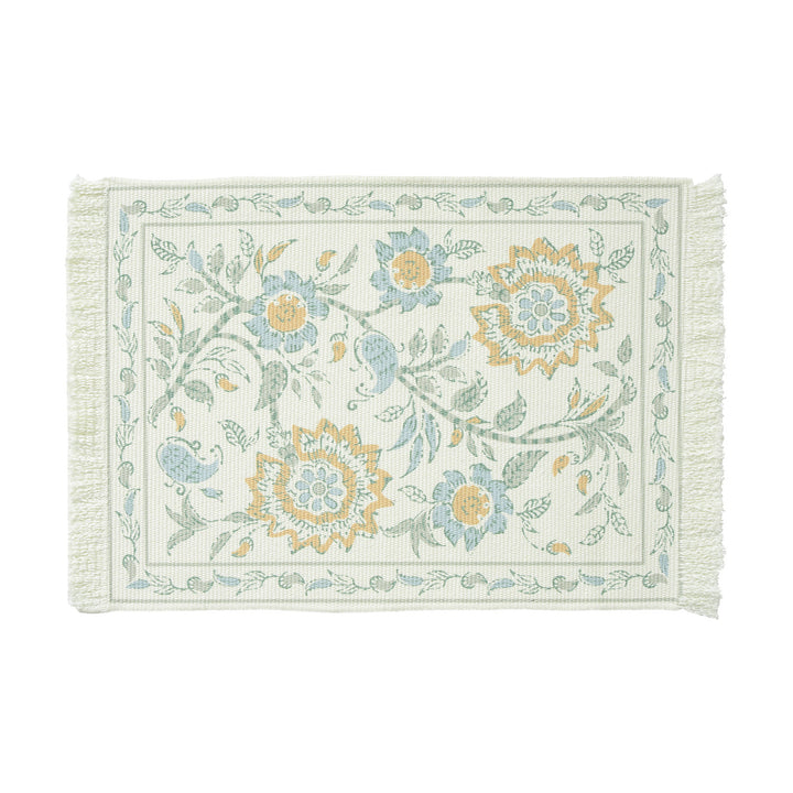 Round handmade woven decorative rug with fringes and botanical pattern