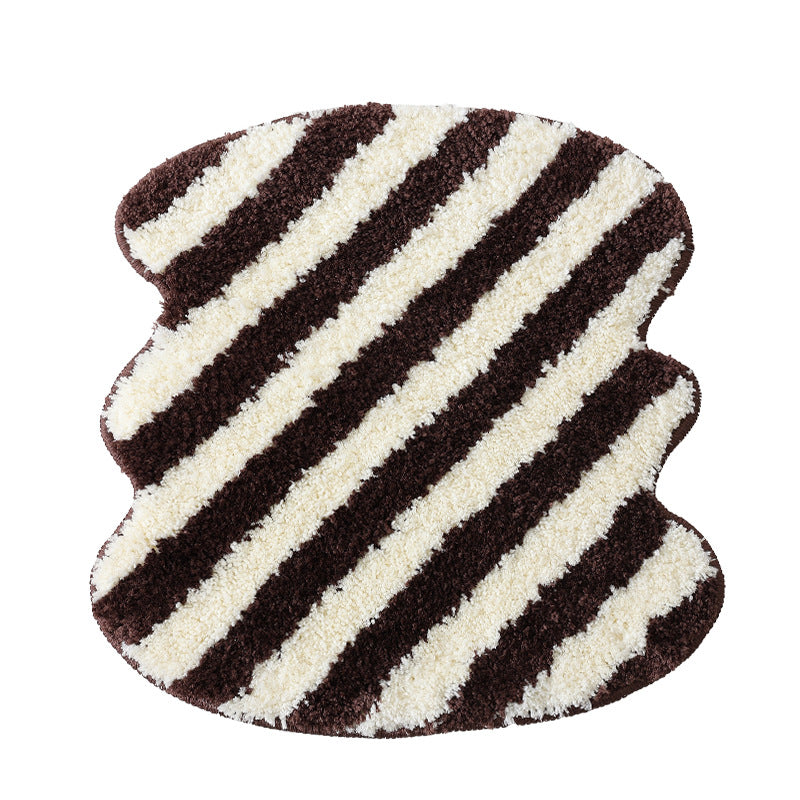 High-pile bath mat rug with diagonal stripe structure and organic shape