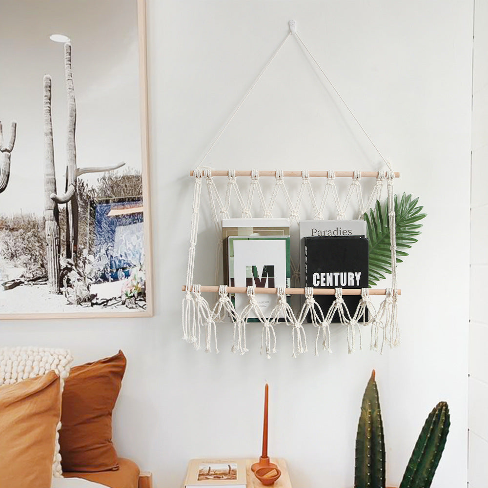 Elegant macramé wall hanging with decorative tassels and wooden frame