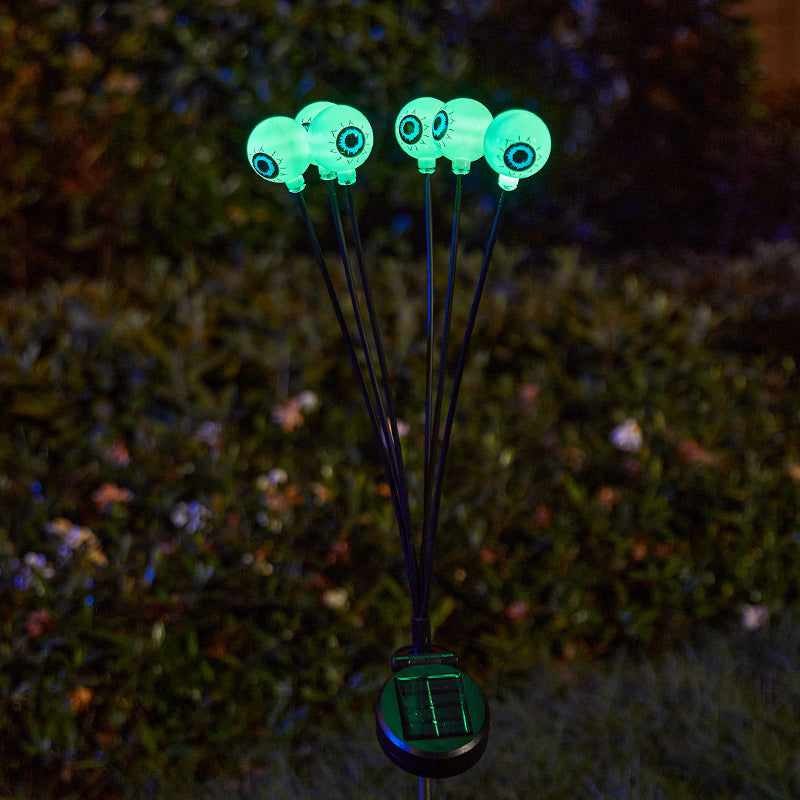 Creepy garden lights with eye motif