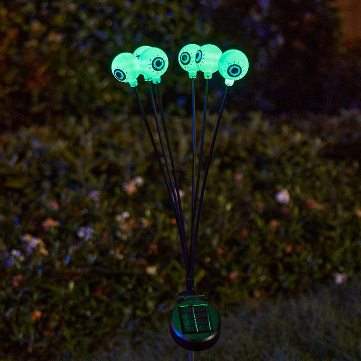 Creepy garden lights with eye motif
