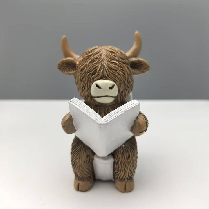 Funny decorative figure of a Highland cow in a bathtub