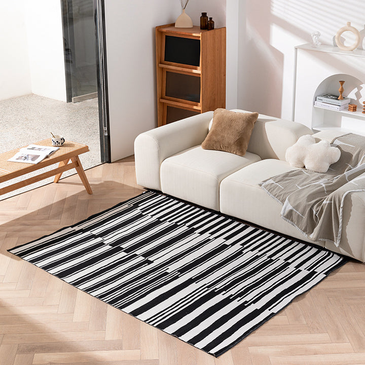 Modern flat-woven living room rug with abstract geometric design
