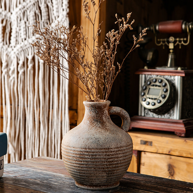 Rustic ceramic vase with handles