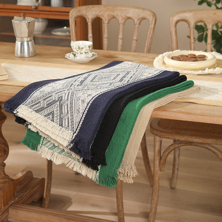 Handwoven table and console runner made of cotton blend fabric with geometric diamond pattern and fringes