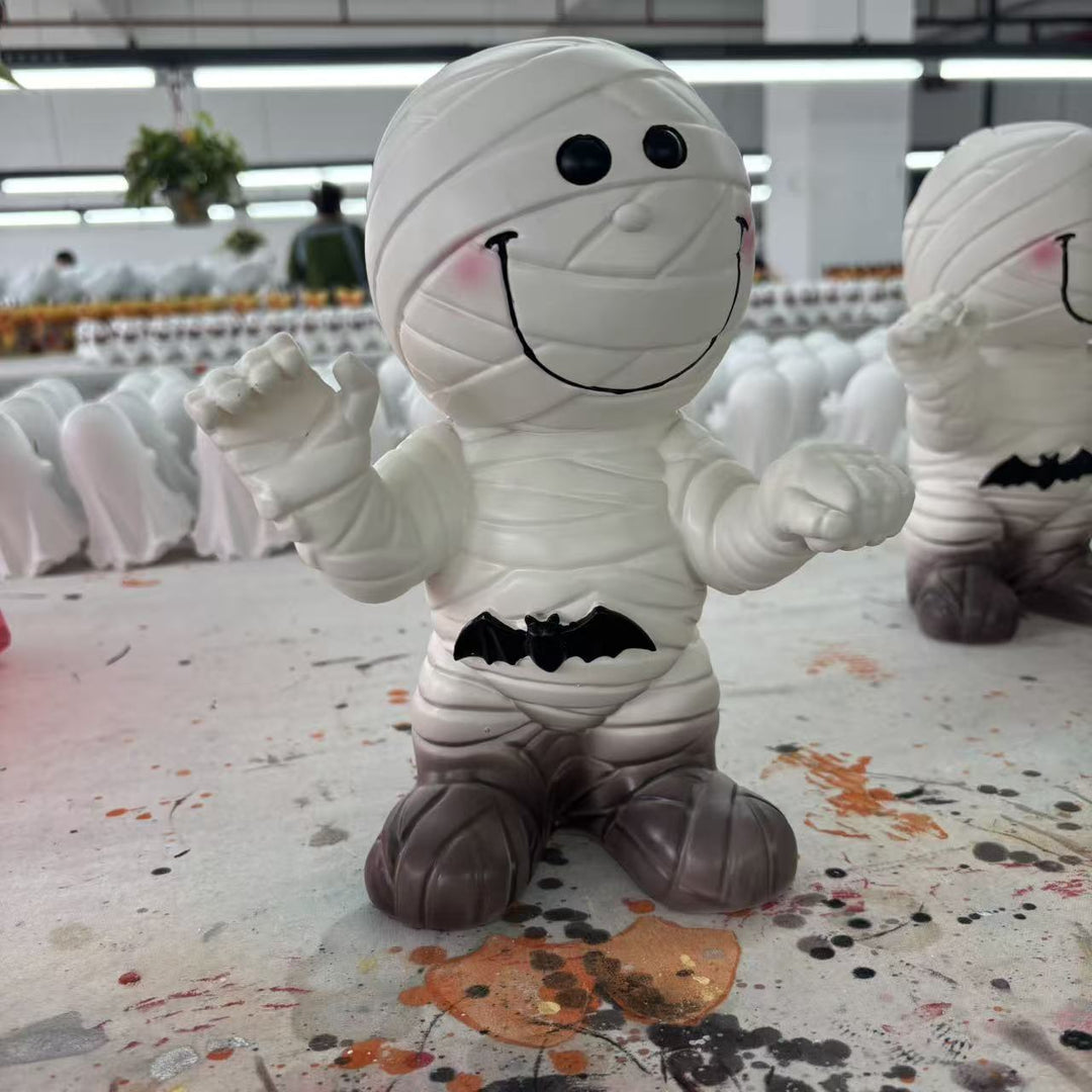 Decorative mummy figure with cheerful smile