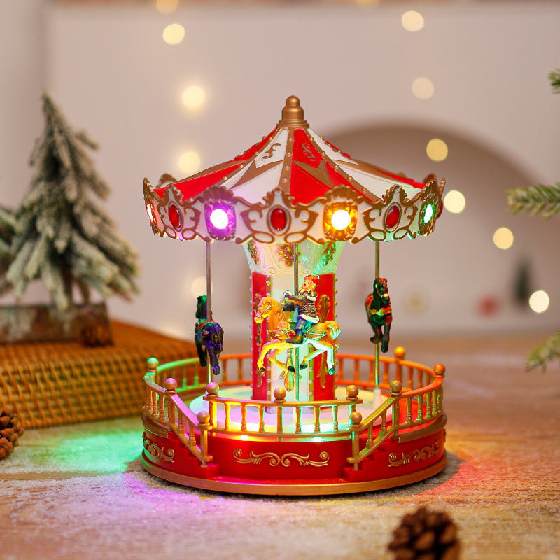 Illuminated Christmas village decoration with moving figures