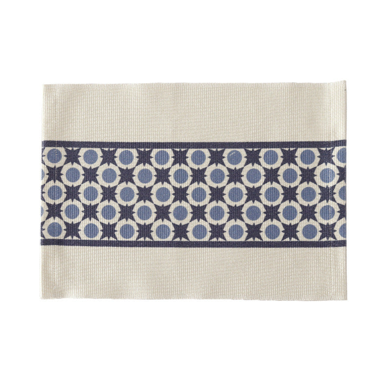 Woven placemat made of cotton blend with geometric diamond trim and fine texture