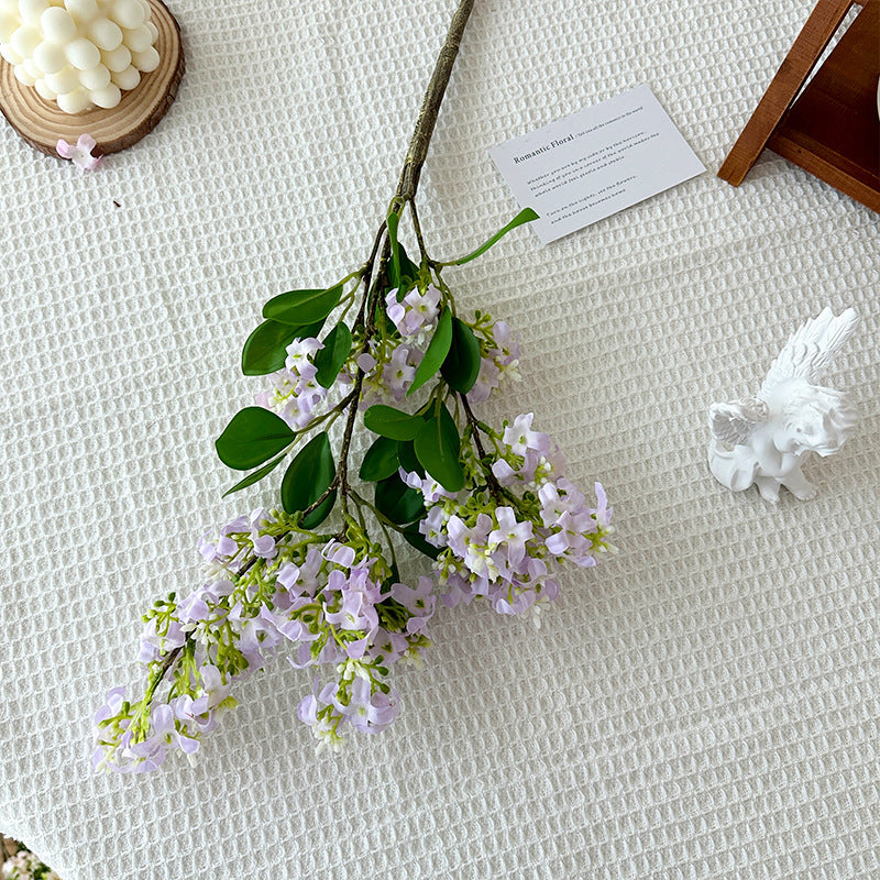 Decorative artificial flower branch