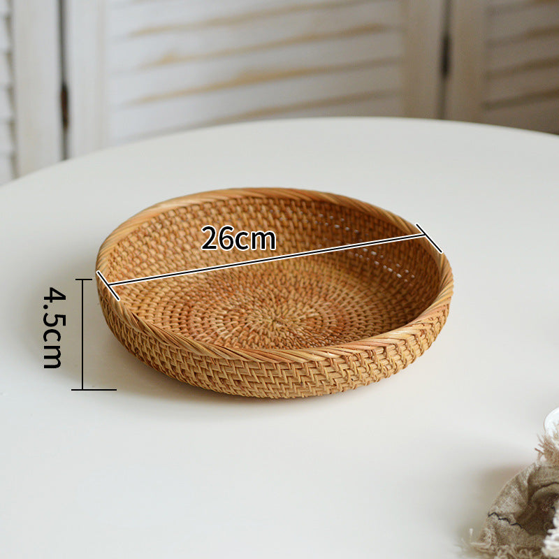 Round serving platter made of braided rattan