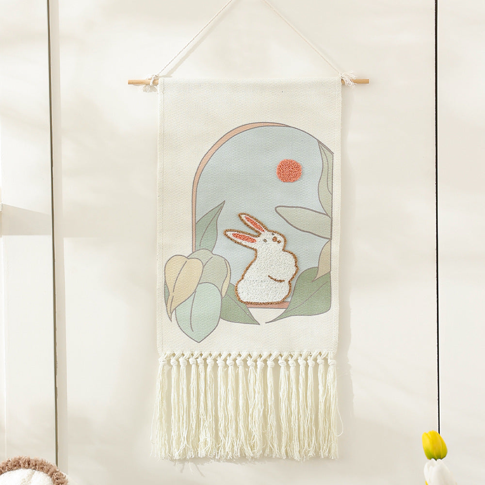 Woven cotton wall hanging with punch needle flower relief and fringes