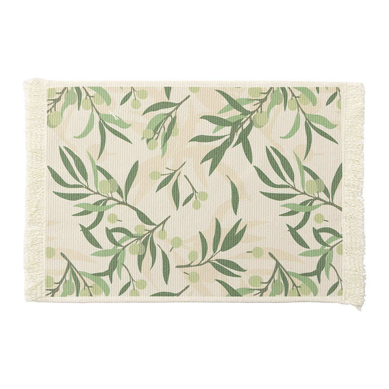 Floral woven bath mat with decorative fringes