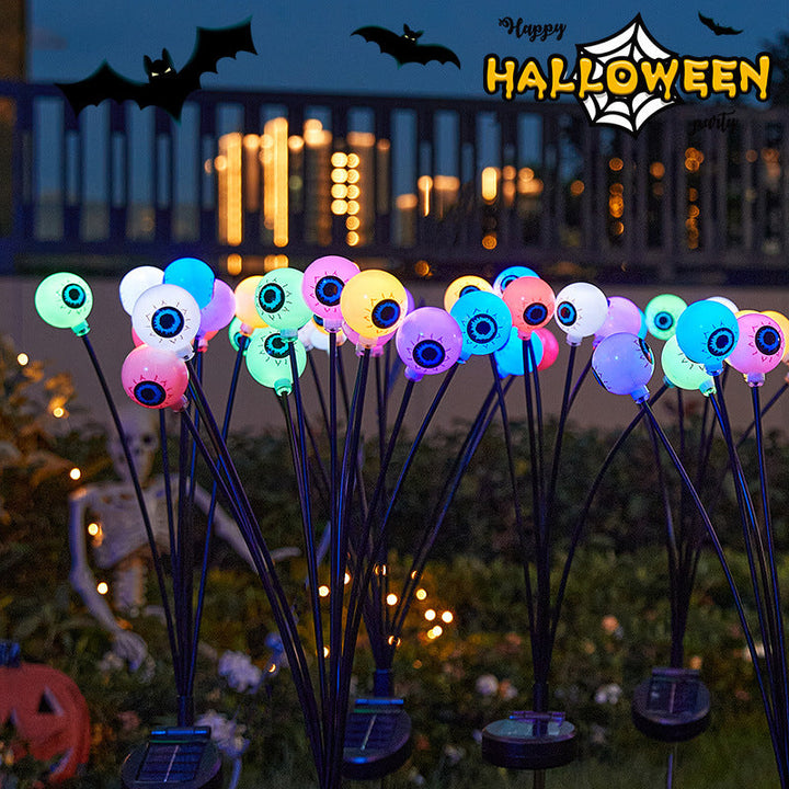 Creepy garden lights with eye motif