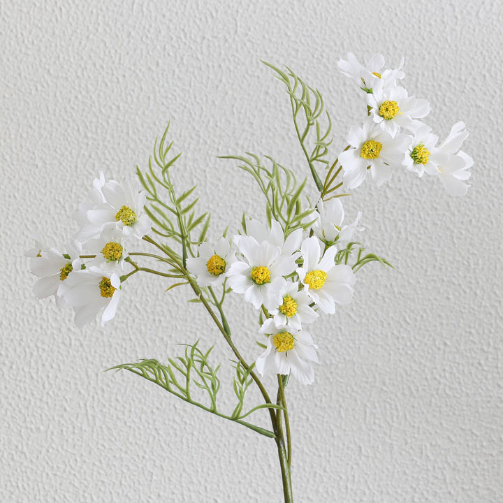Artificial flower branch with bright pink flowers