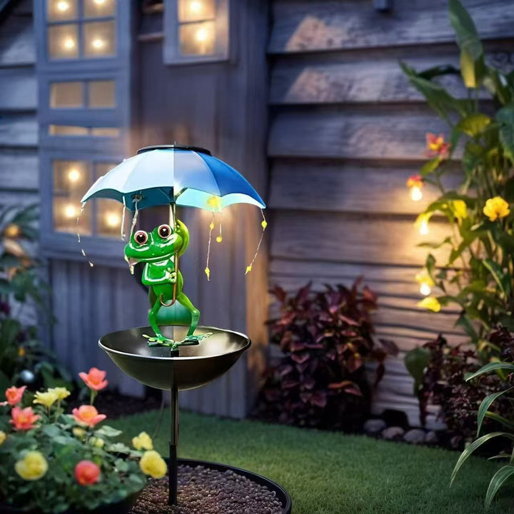 Decorative garden birdhouse stake with protective umbrella and playful frog decoration