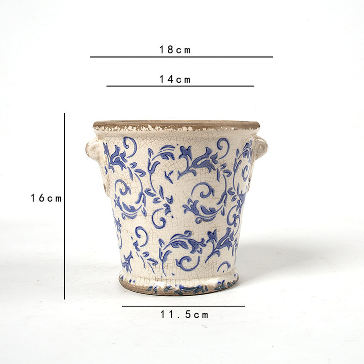 Decorative flower pot with floral embellishments