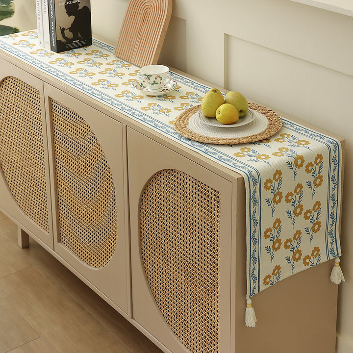 decorative table runner made of woven cotton with tassels