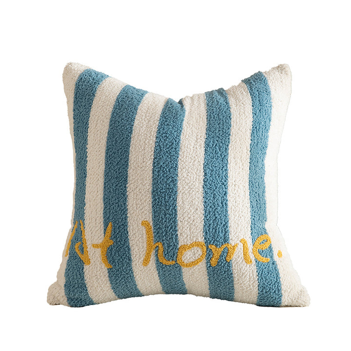 Striped bouclé decorative pillow with embroidered lettering and cuddly filling