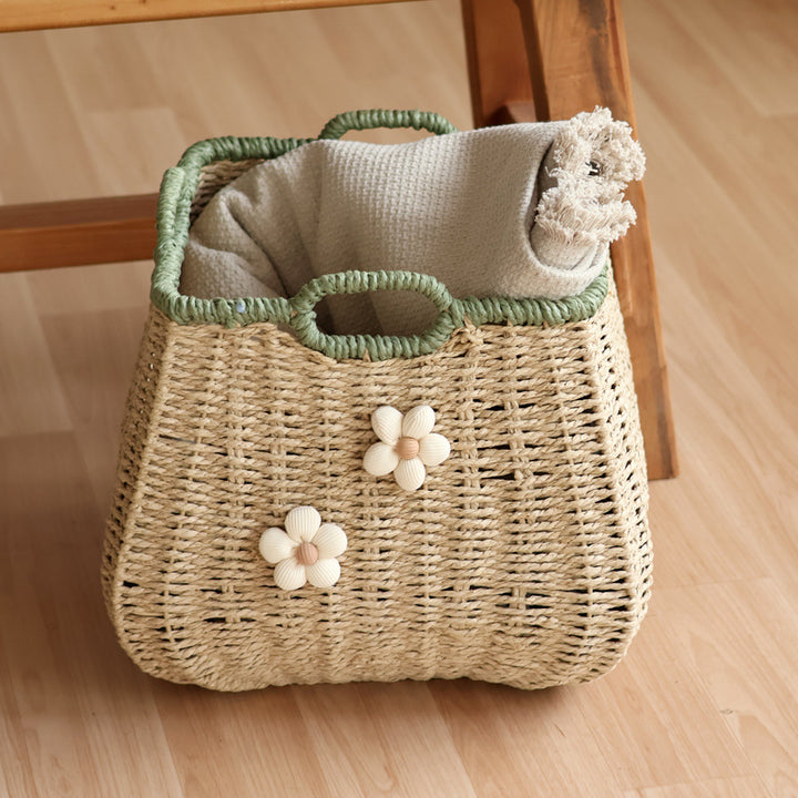 Handcrafted basket with flower appliqué