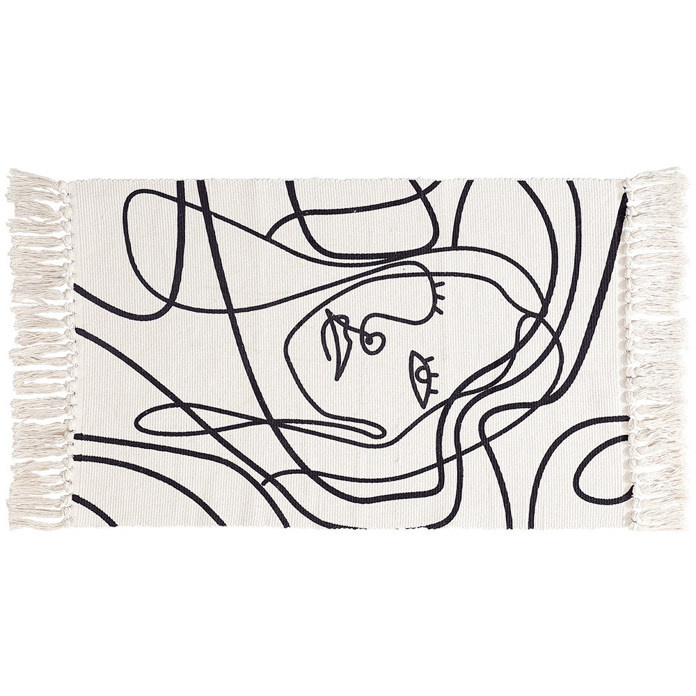 Woven cotton tabletop set with abstract line art