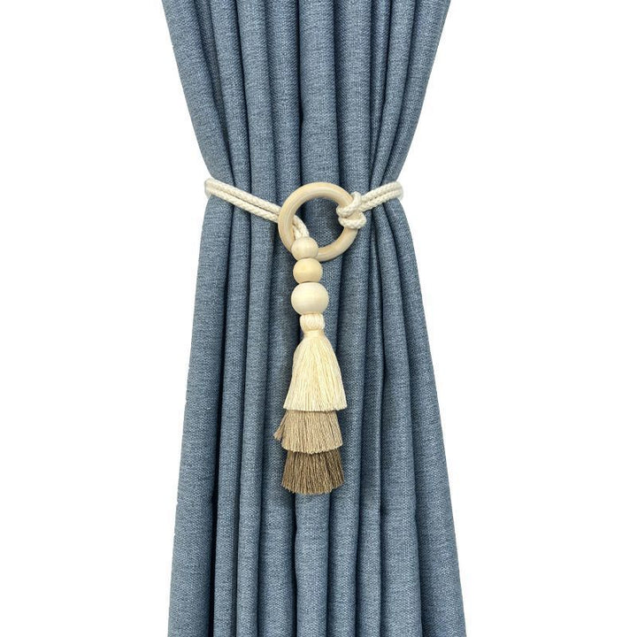 Decorative curtain holder with tassels