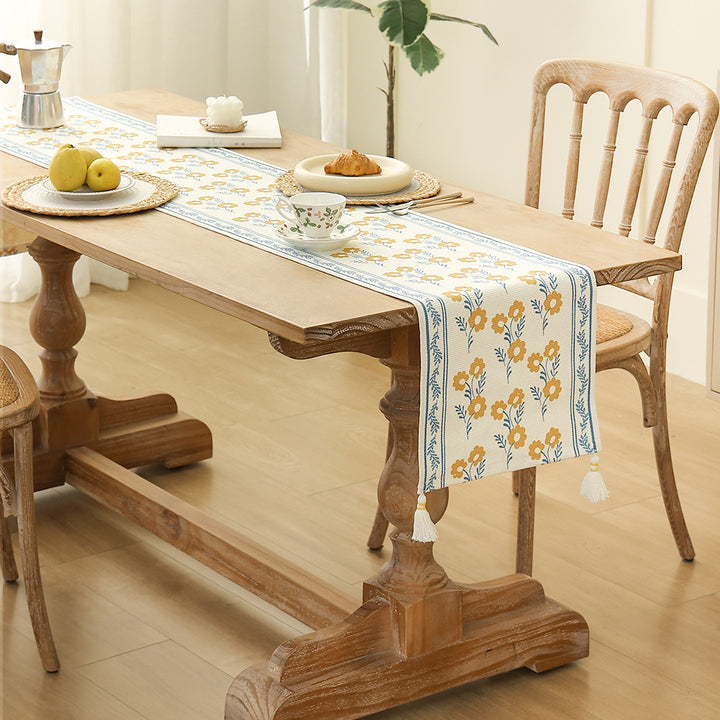 decorative table runner made of woven cotton with tassels
