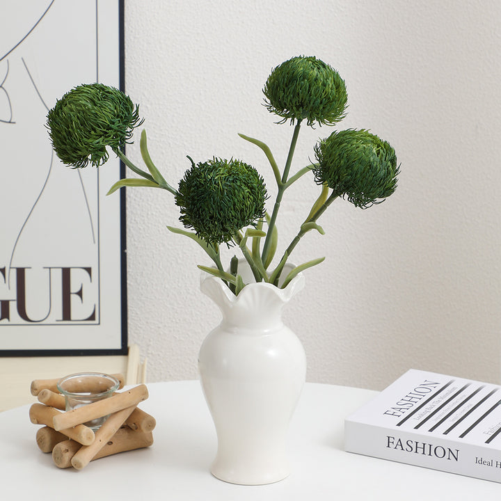 Decorative artificial flower branch with a natural appearance
