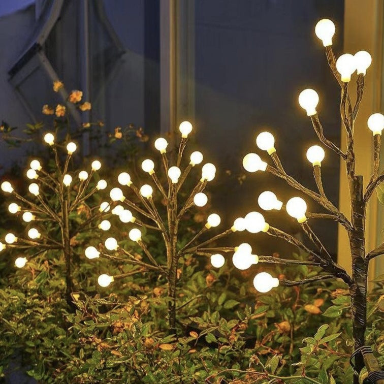 Battery-operated animated bat and spider LED string lights for outdoor Halloween display