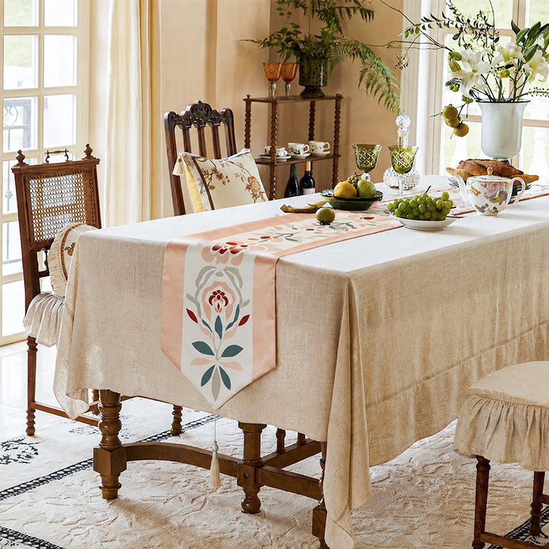 Handcrafted satin table runner with Oriental medallion pattern and decorative tassels
