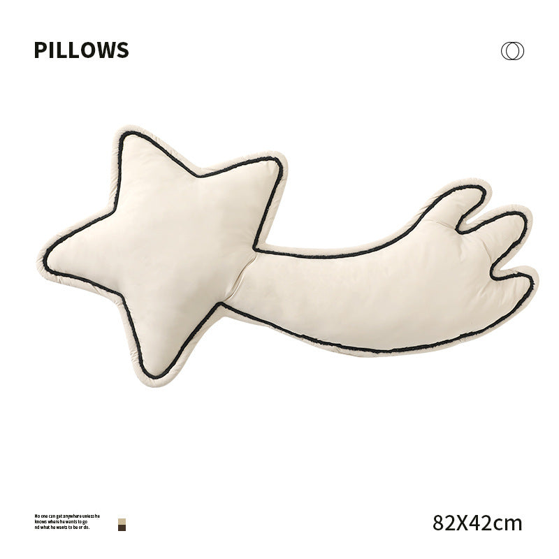 Decorative star cuddle pillow with tail and quilted piping