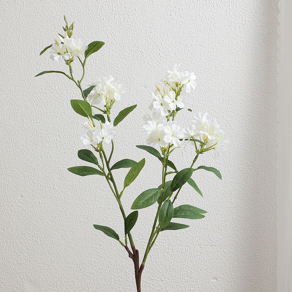 Decorative art branch with white flowers