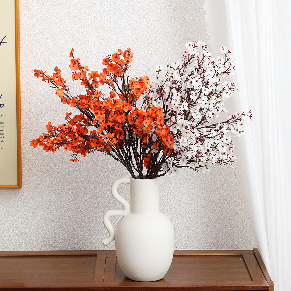 Decorative artificial flower branch