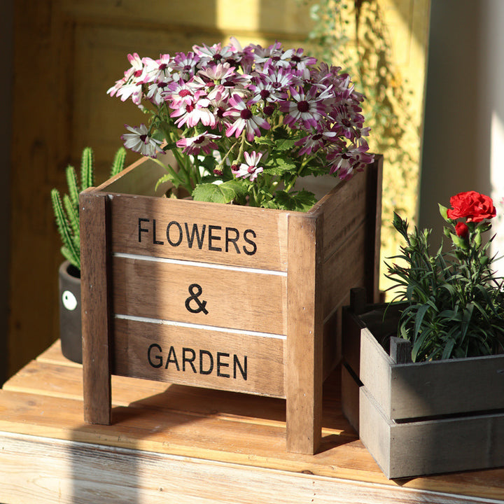 Decorative wooden box for plants