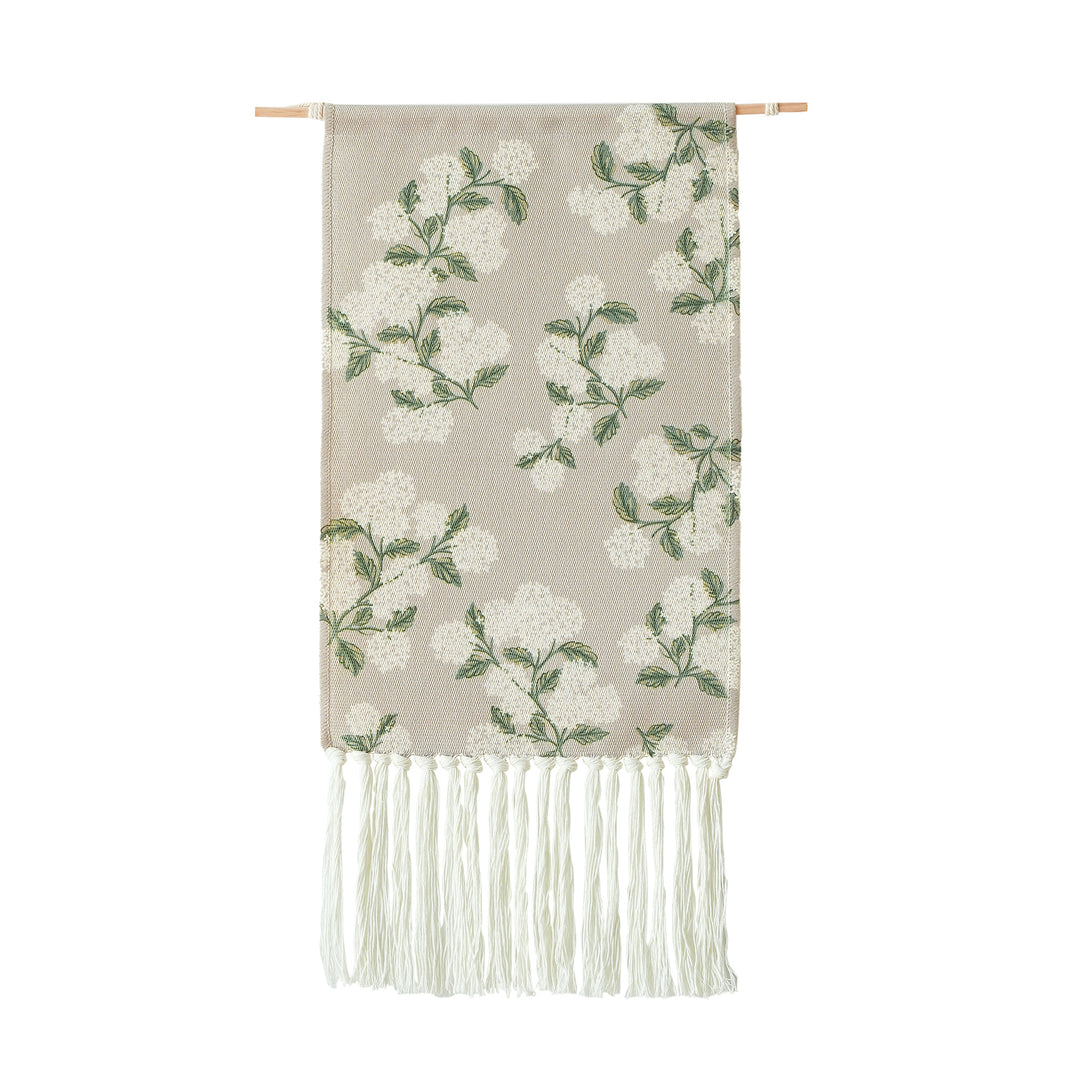Woven wall hanging with floral jacquard structure and long fringes