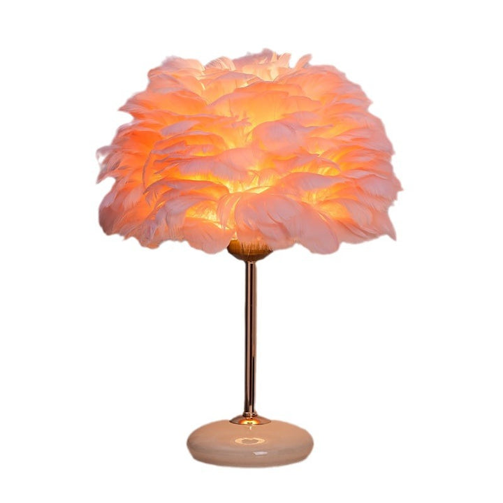 Feather shade table lamp with ceramic base and polished metal rod