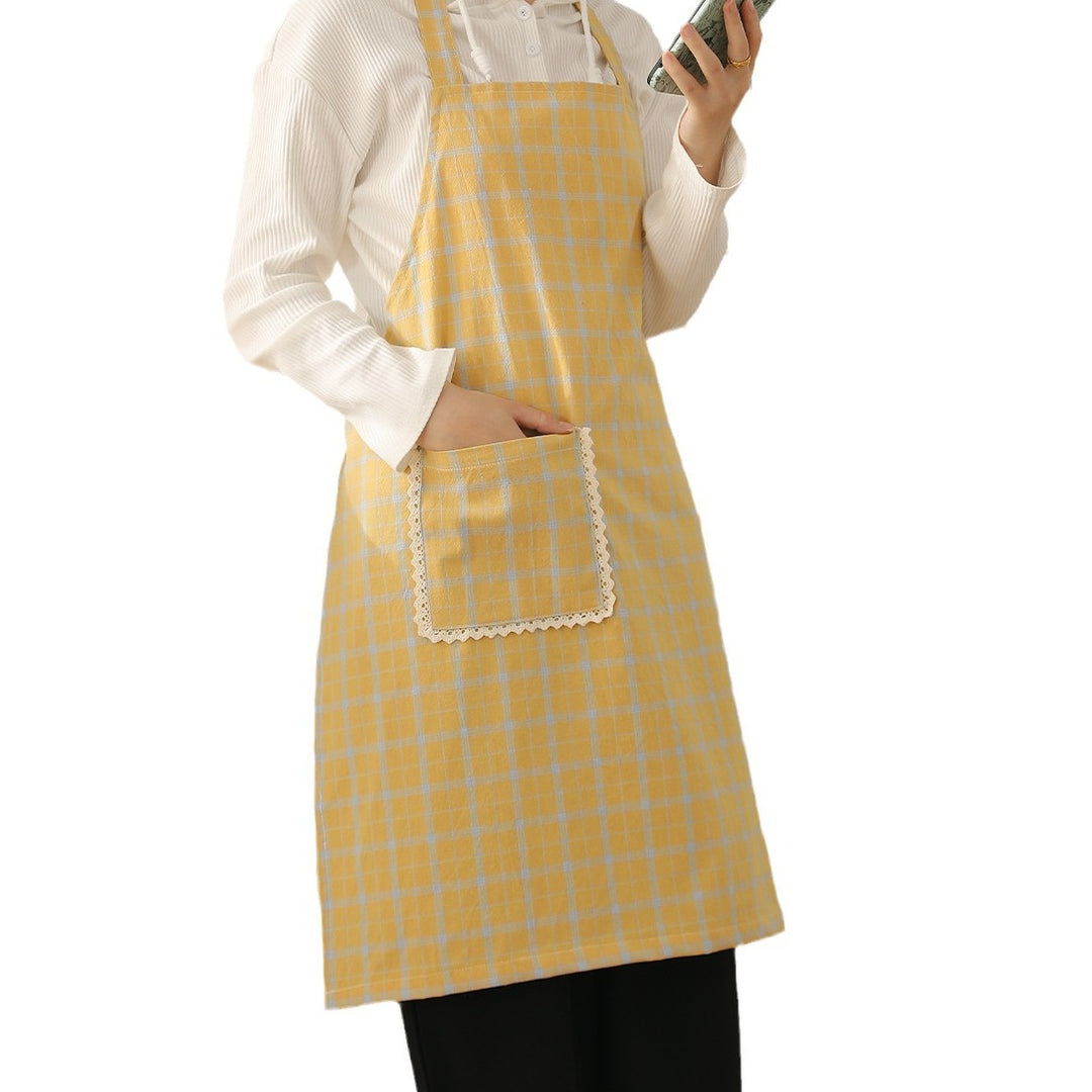 Bib apron made of cotton blend with patch pocket and lace trim