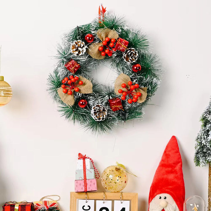 Festive Christmas wreath with pine cones and berries