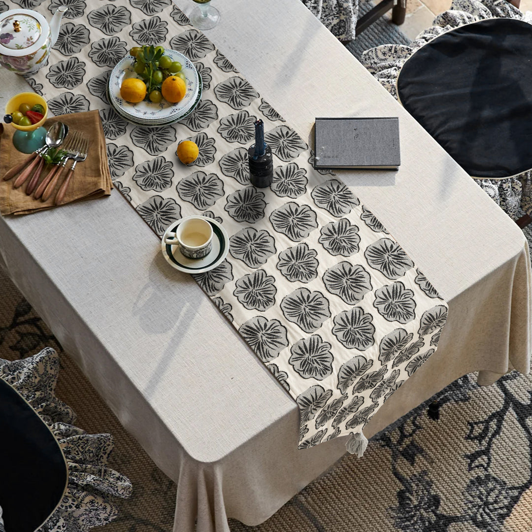 Woven double-sided linen table runner with tassels and hand-drawn swallow print