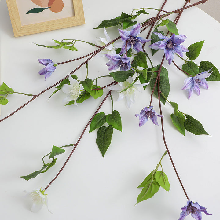Artificial flower branch with lifelike fig tree leaves