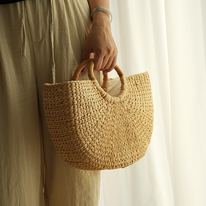 Handmade beach bag made of braided rattan